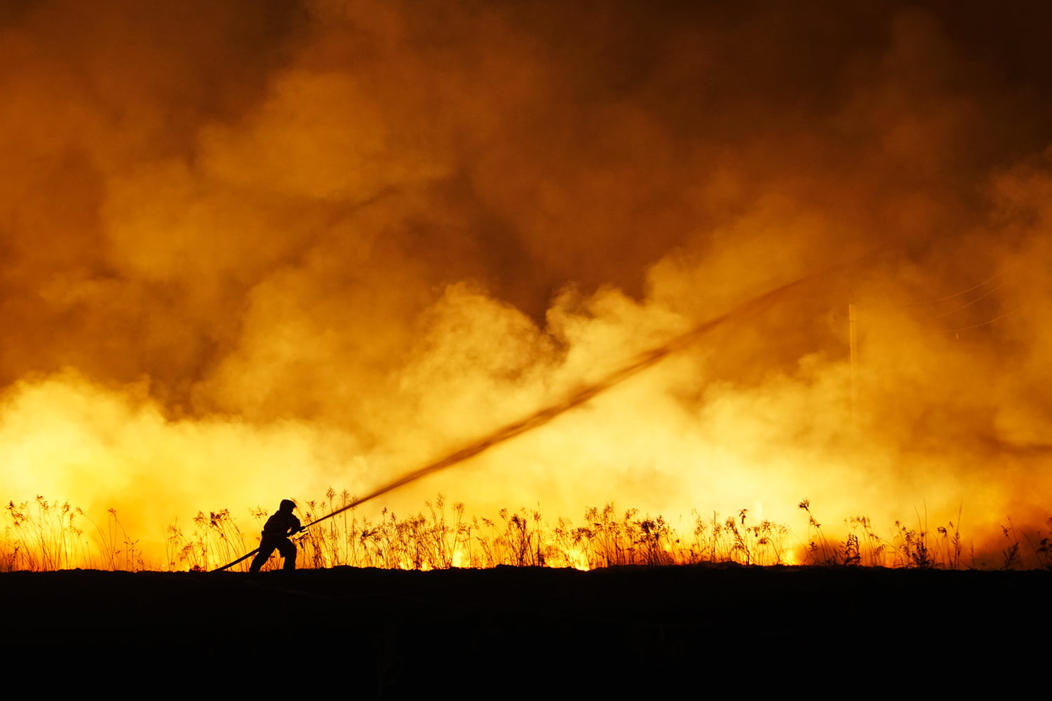 Storia dei vigili del fuoco: un pompiere in azione